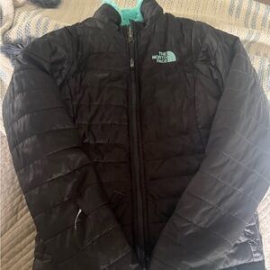 The North Face Black Quilted Jacket. Size M 10-12.